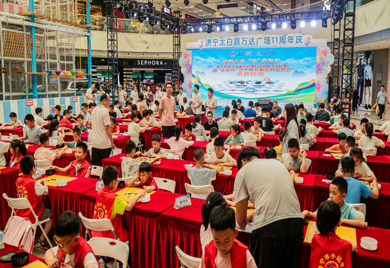 黑白对弈绽光彩 围棋总决赛万达收官 黑白对弈绽光彩 围棋总决赛万达收官