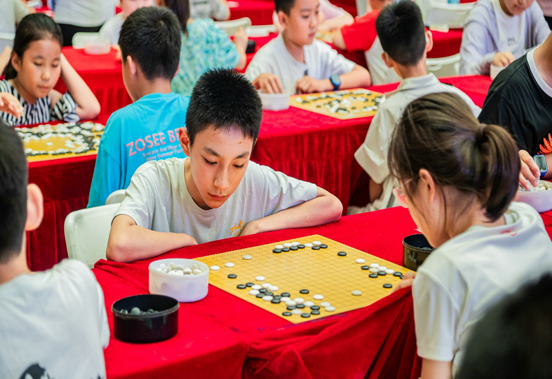 黑白对弈绽光彩 围棋总决赛万达收官 黑白对弈绽光彩 围棋总决赛万达收官