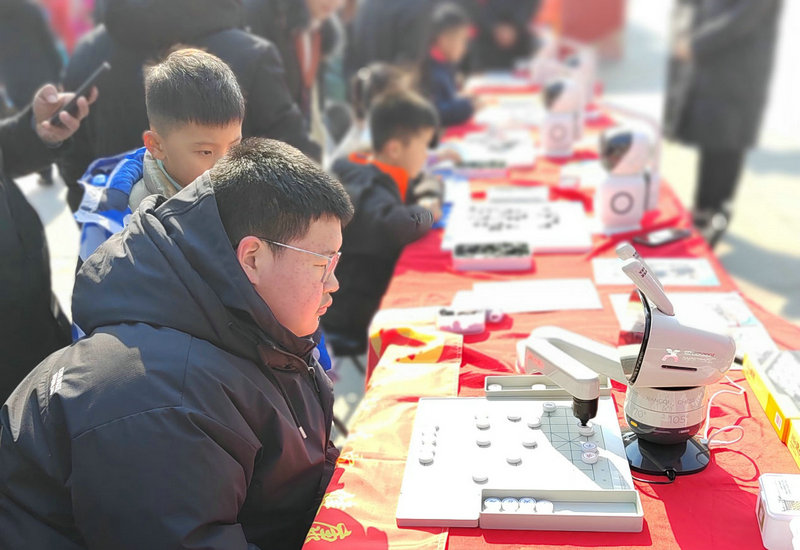 棋乐融融贺新春 AI对弈亮相运河大集